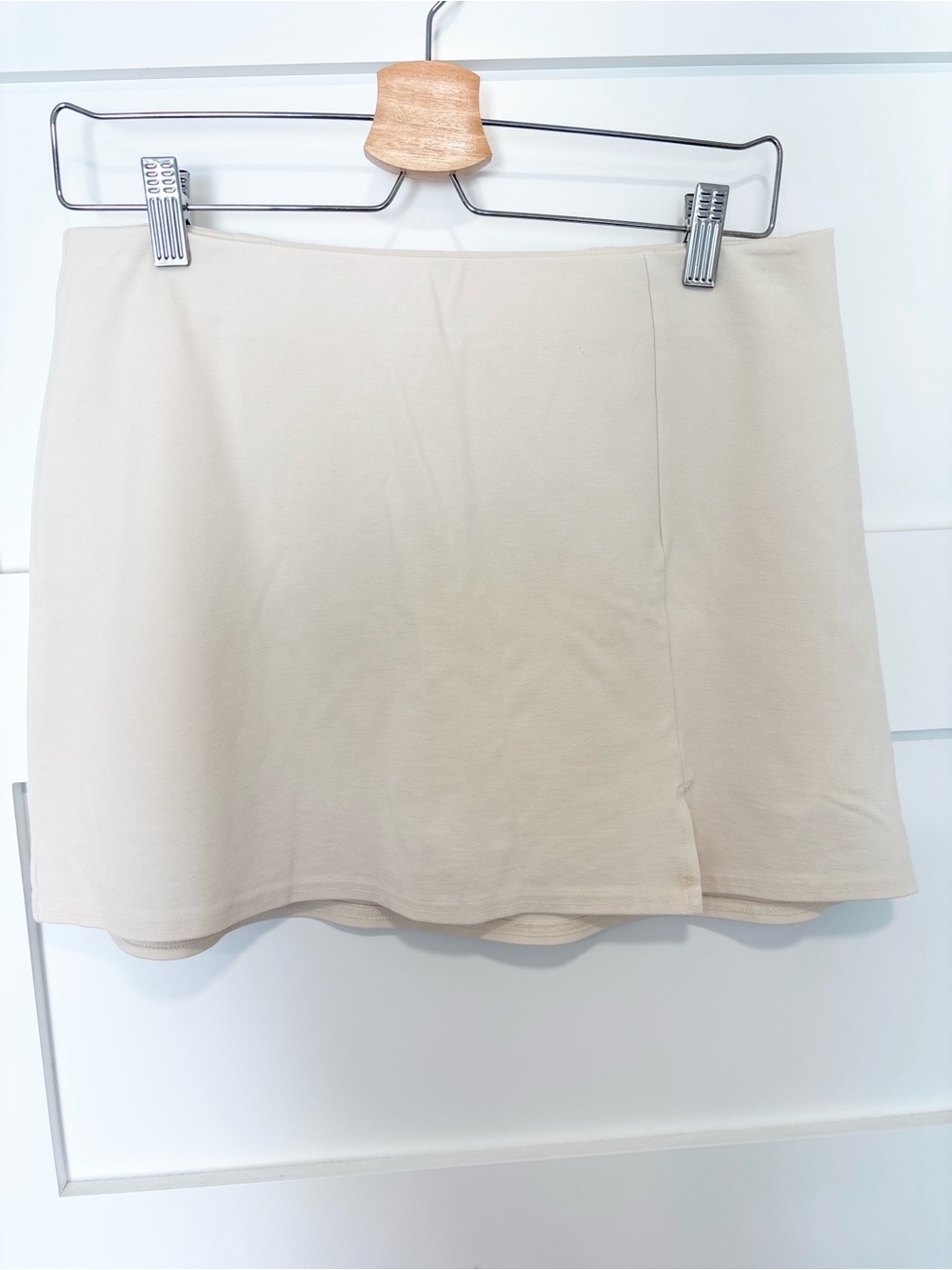 2 skirts for $30 Beige and Black AE Mini Skirts.